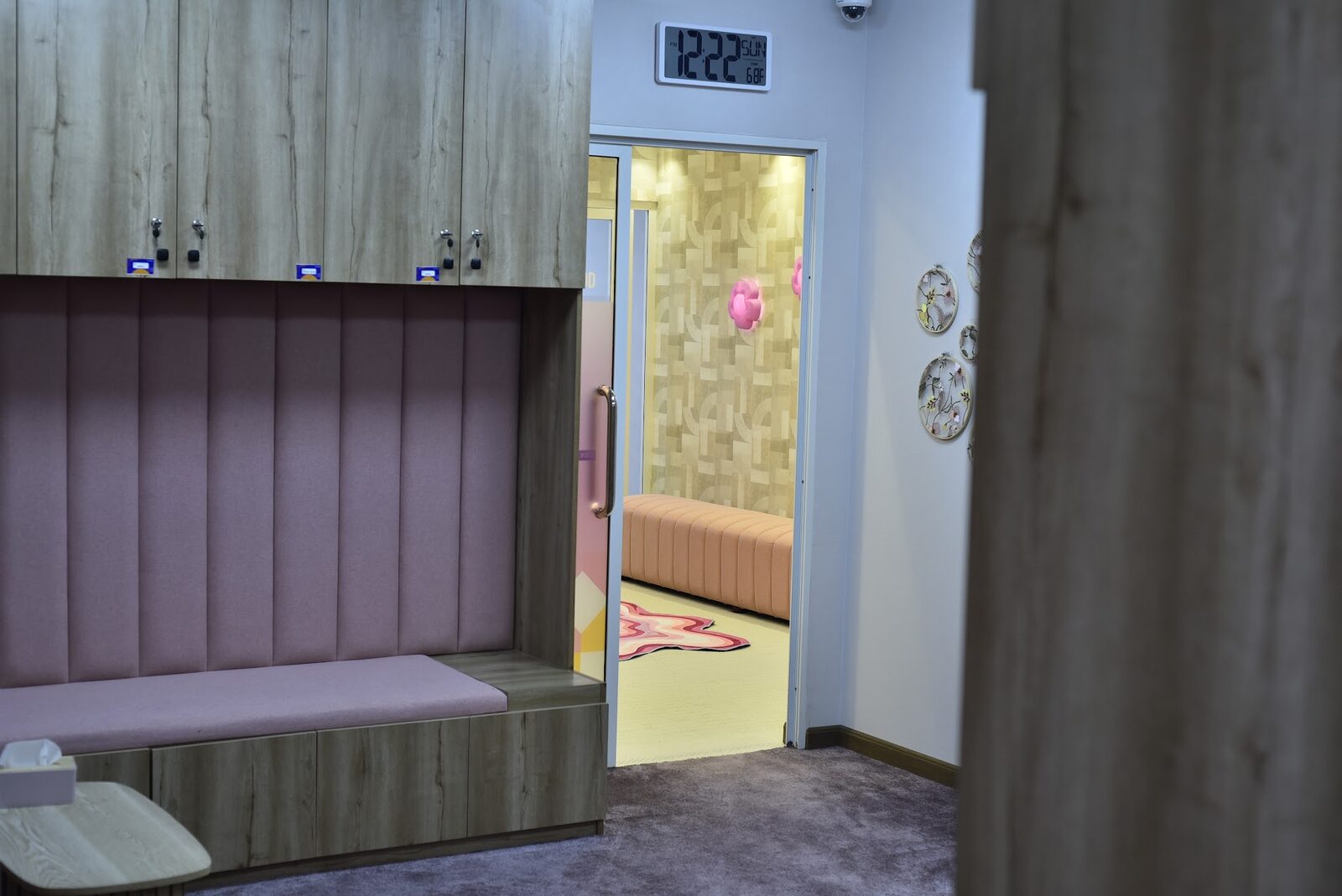 Student locker and rest area with cushioned bench seating