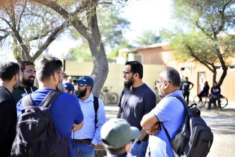 Fathers talking together before the walk begins