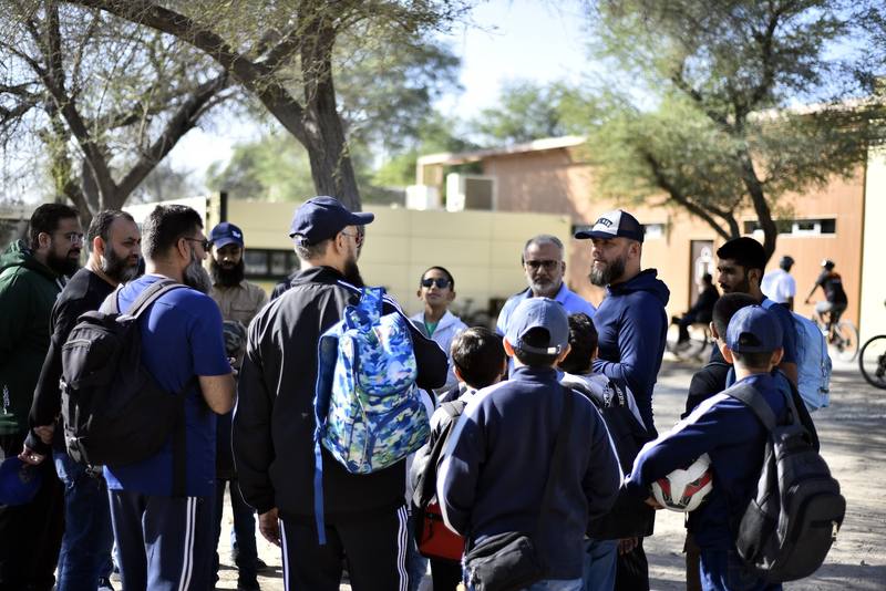 Full group of fathers and sons gathered before the trail walk