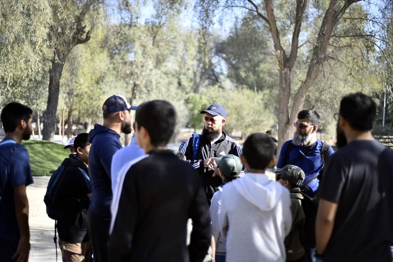 Leader explaining the route to the gathered group