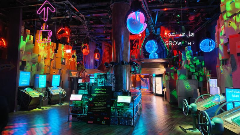 Colourful neon exhibit on consumption at TERRA