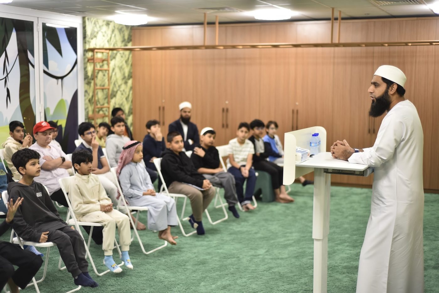 Students seated in the Forest Hall during the talk