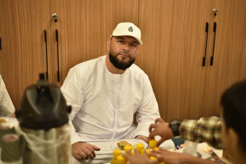Guest seated at the refreshment table
