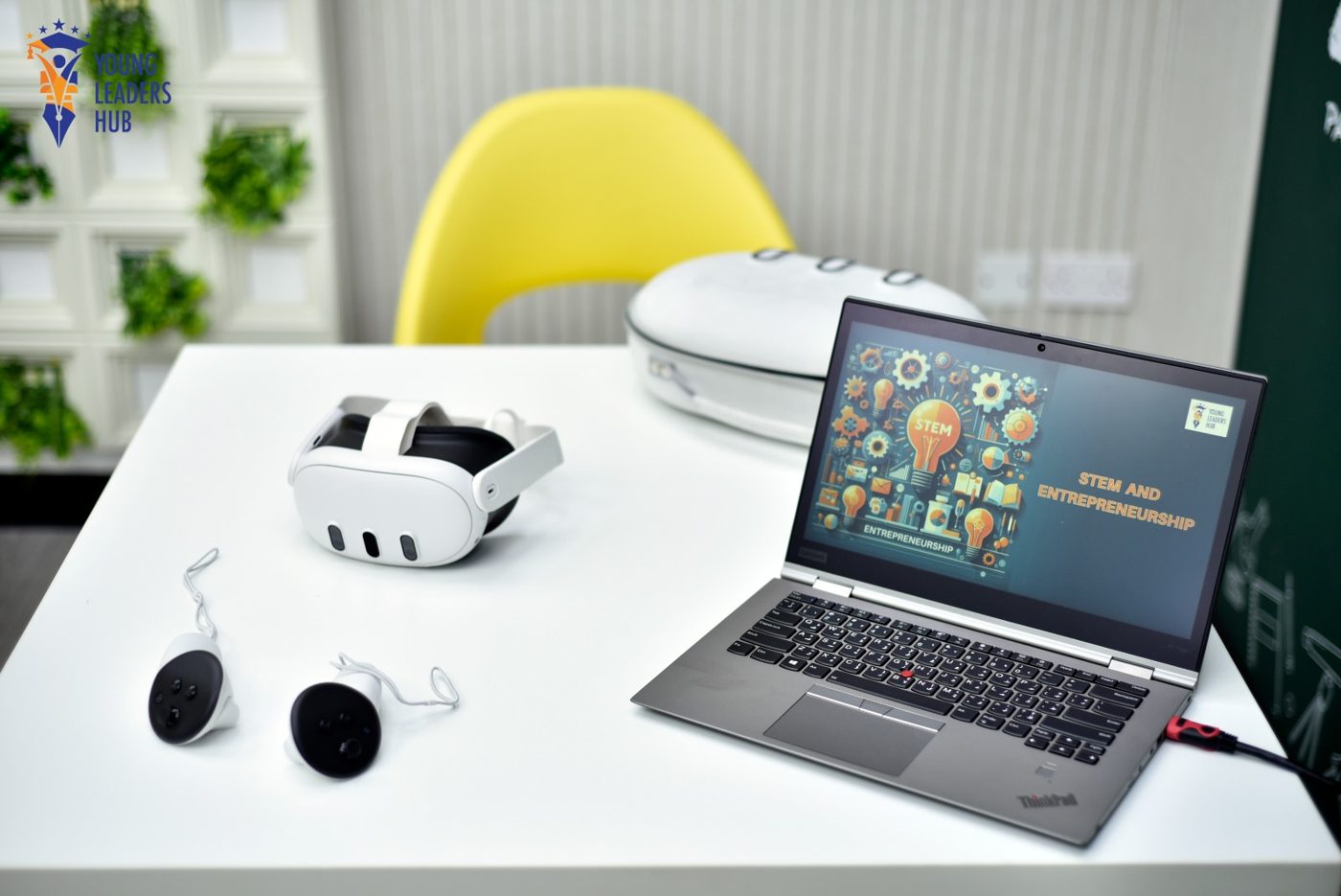VR headset and controllers set up beside a laptop in the lab